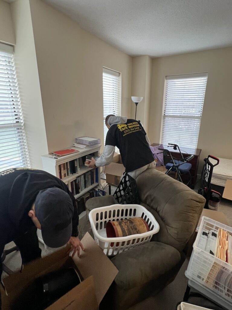 Golden Tape Movers team packing household items during a Washington, DC move